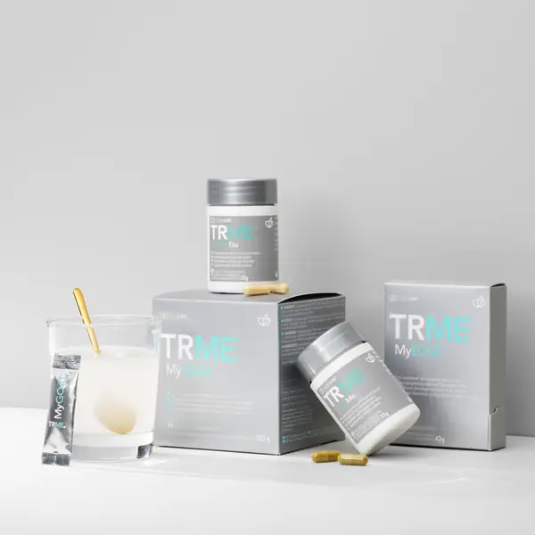 Produkty TRME MyBalance od Nu Skin – zestaw suplementów z koktajlem i kapsułkami.